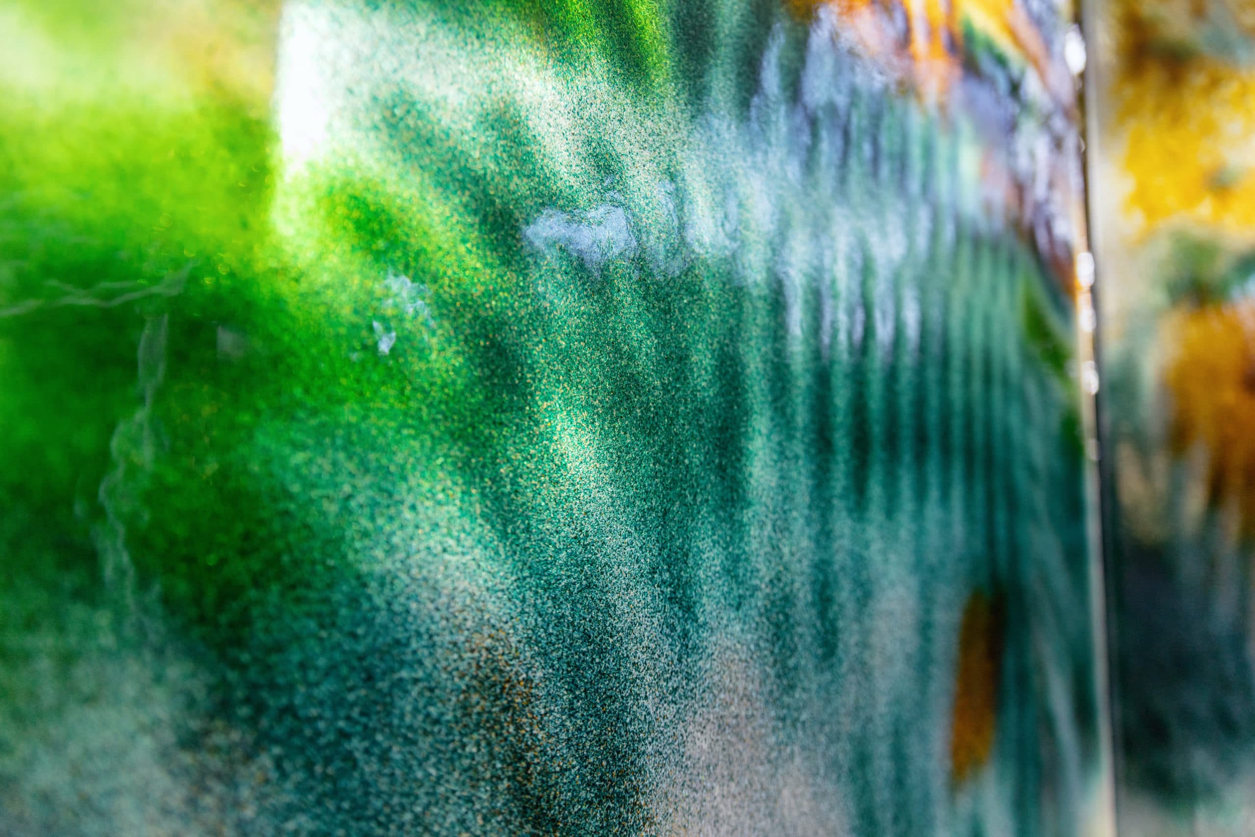 Tactile relief and fused color pigment detail