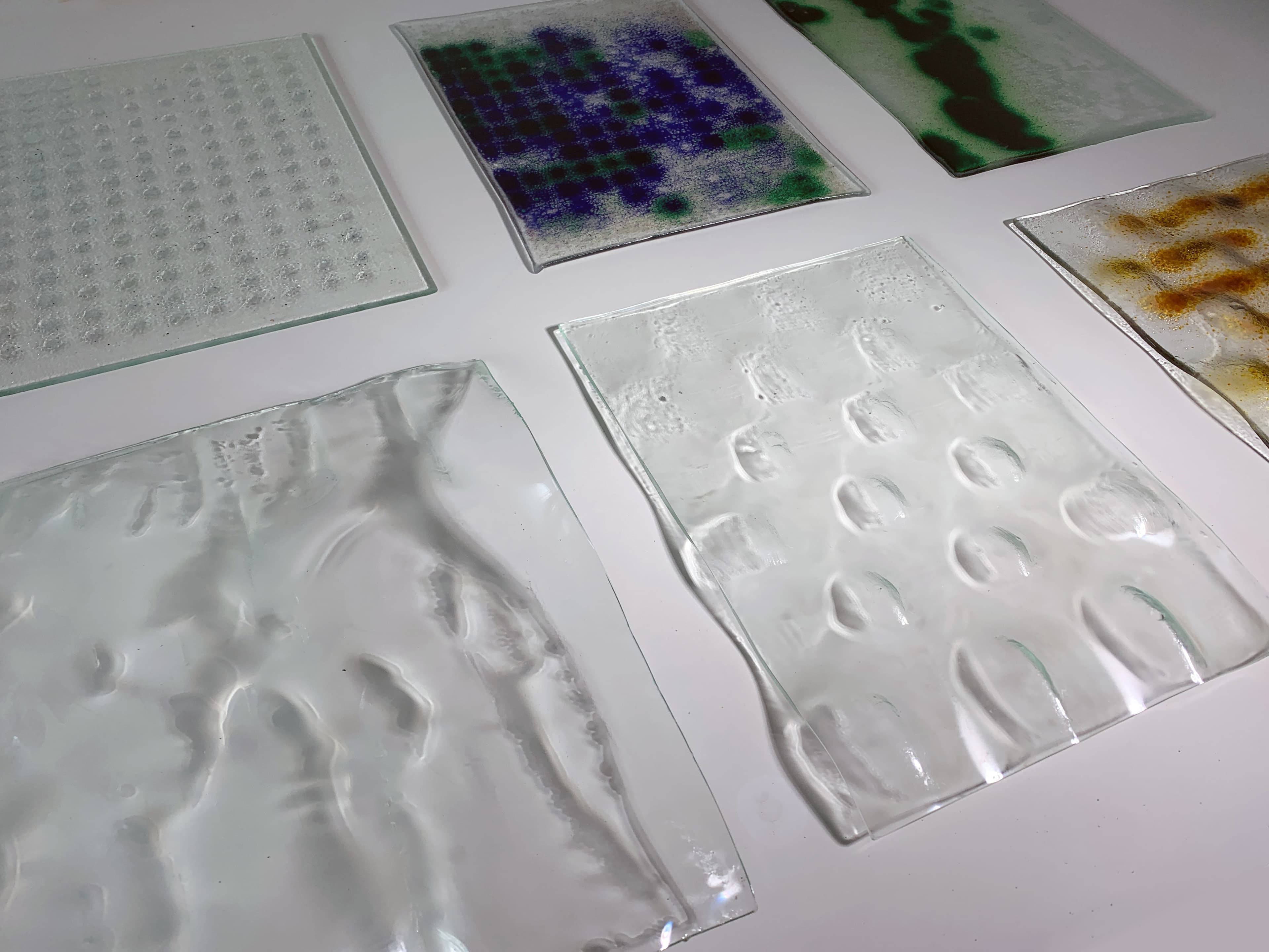 Stack of finished relief glass samples
